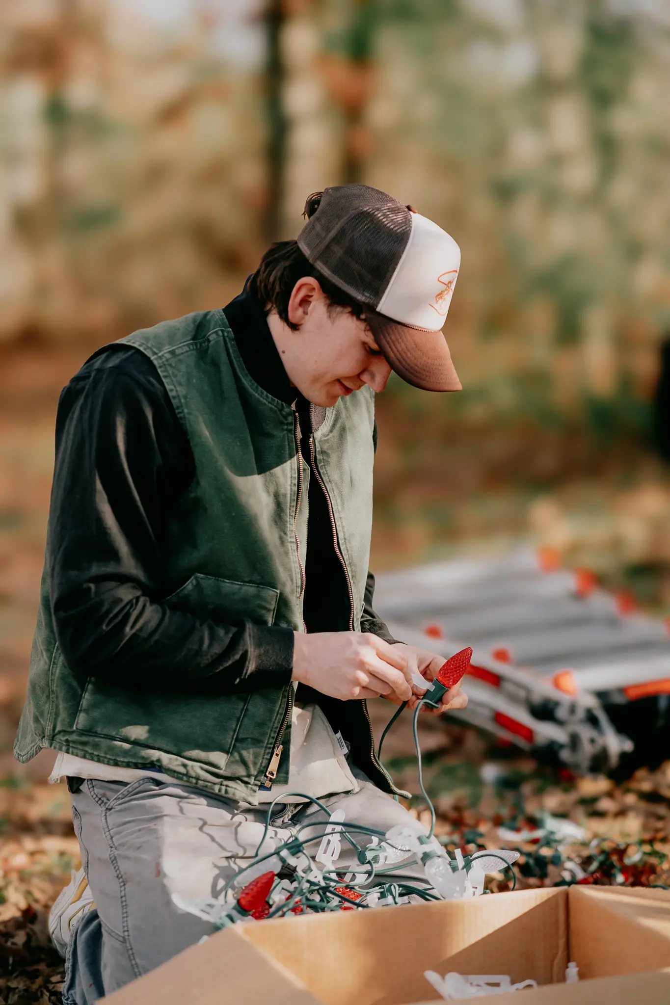 K Legacy Lighting installer preparing holiday light strands before installation